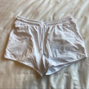White sweat shorts